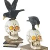Set Of 2 Resin LED Skull On Books With Crow Halloween Figurines